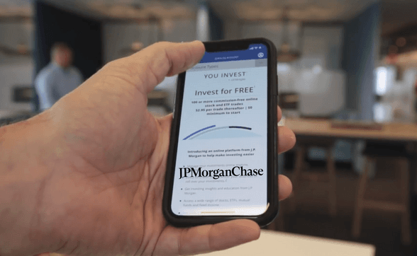 A phone showing the JPMorgan Chase You Invest onboarding screen.